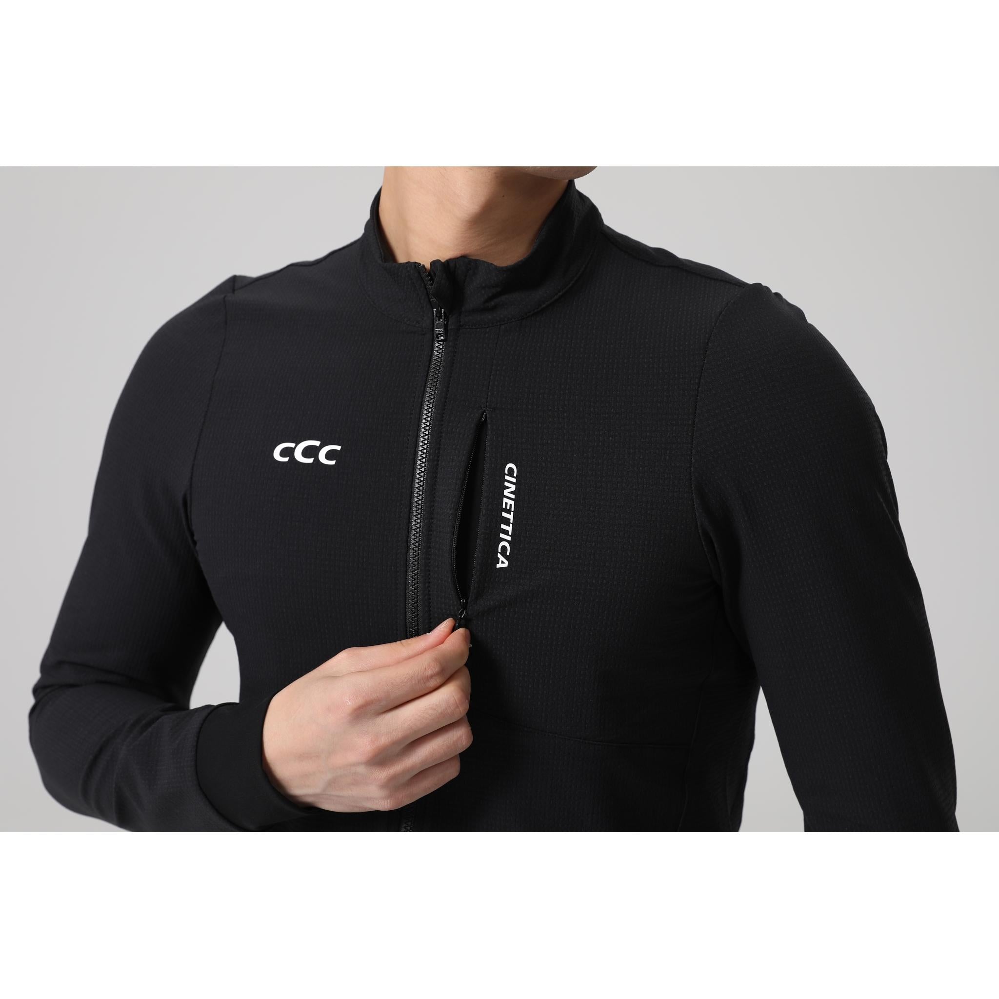 Black Cinettica Vincita wind jacket with full zip, textured fabric, and vertical zippered pocket.